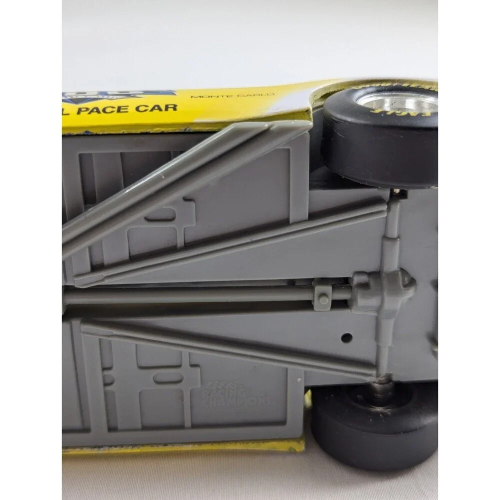 1996 Racing Champions Chevrolet BriCkyard 400 1:64 Monte Carlo Car Yellow